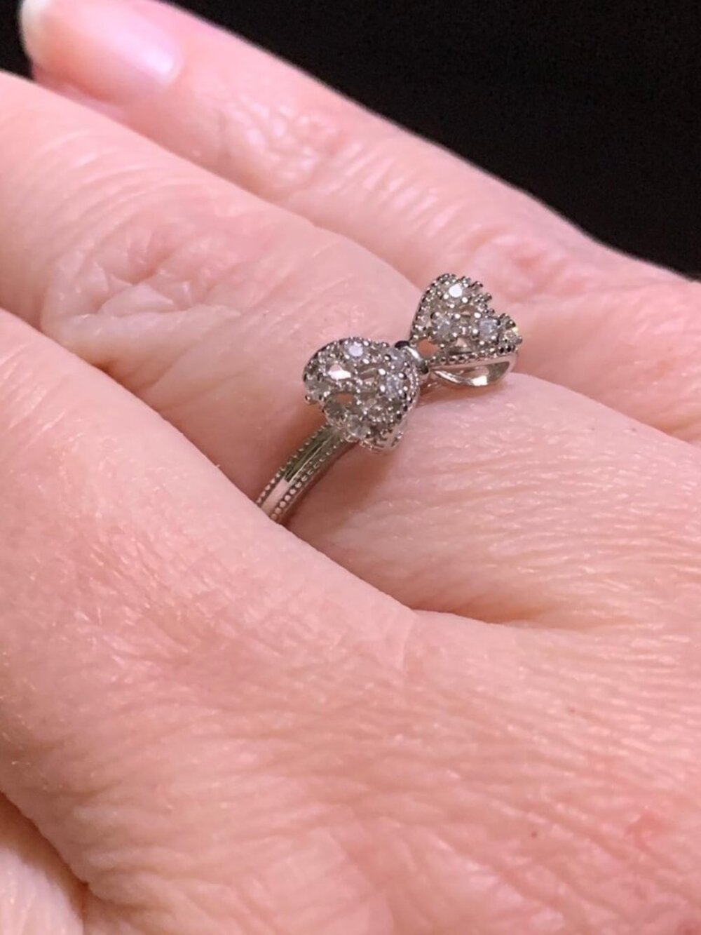 .925 Sterling Silver with White Diamond Cubic Zirconia Infinity Forever Bow Ring - Picture 9 of 10